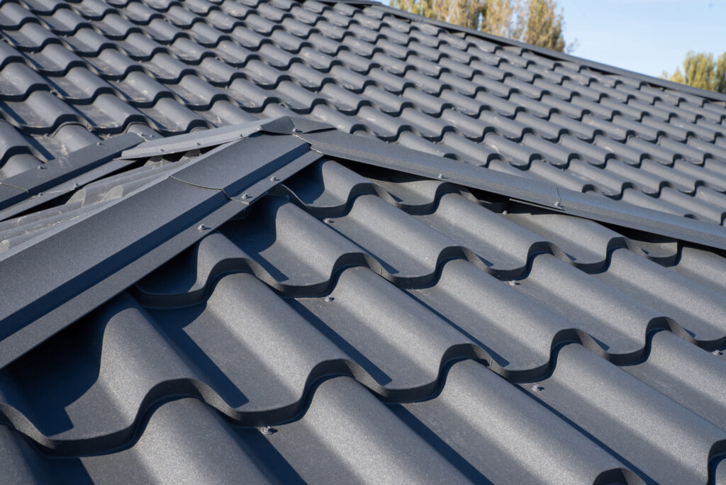 House with a gray metal roof close up